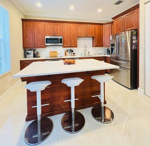 6956 Julia Gardens Drive, Coconut Creek, FL 33073