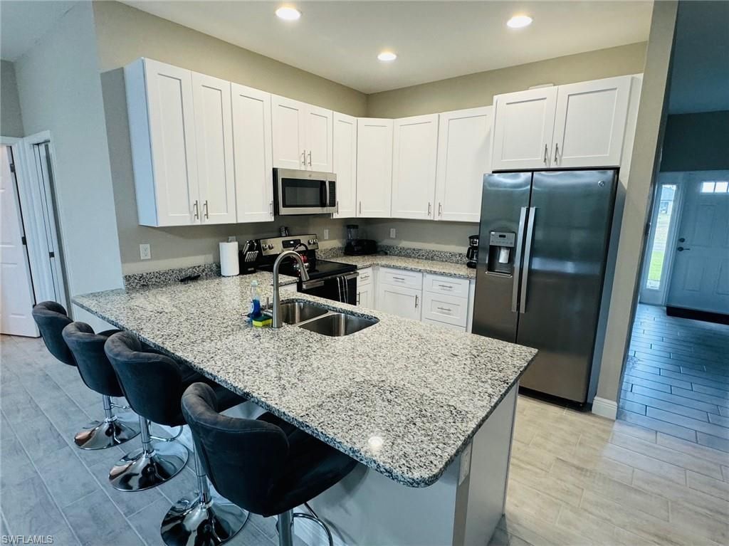 4126 NW 24th TER, CAPE CORAL, FL 33993 — photo 5