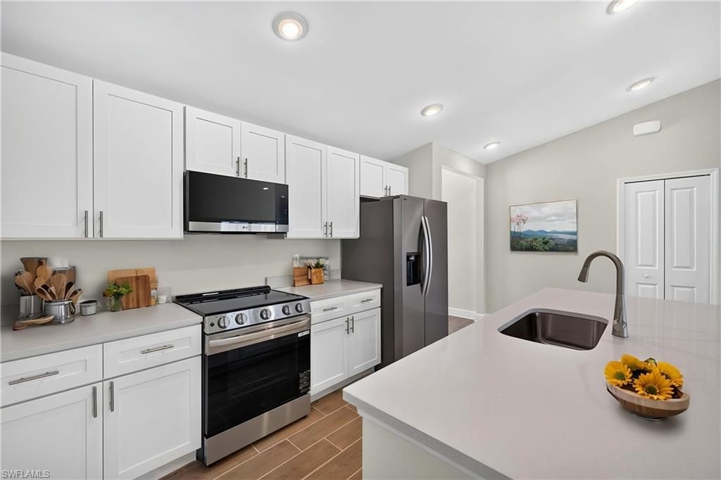 1131 NW 14th TER, CAPE CORAL, FL 33993 — photo 4