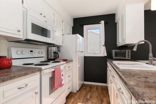 7805 Coachman Lane 61, Georgetown Twp, MI 49428