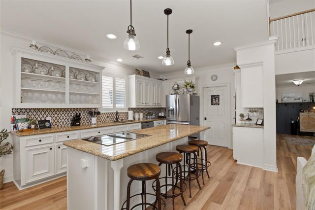 215 Lokai Street, Tiki Island, TX 77554