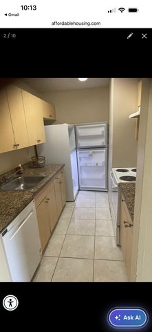 1127 LAKE TERRY Drive F, West Palm Beach, FL 33411