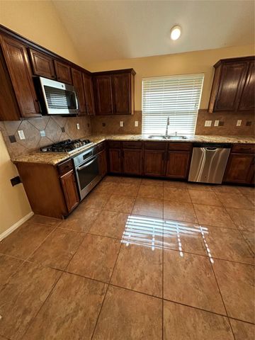 4530 Plantation Pass Drive, Humble, TX 77346