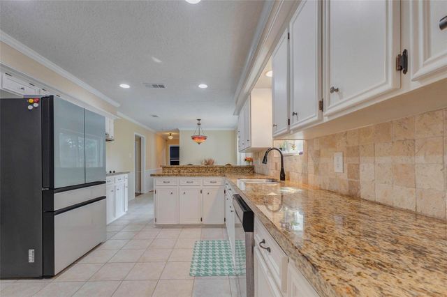 6710 Falling Waters Drive, Spring, TX 77379