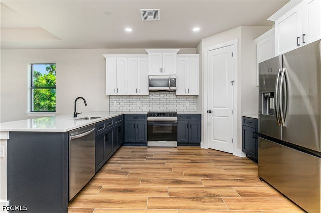 4157 NW 39th AVE, Cape Coral, FL 33993