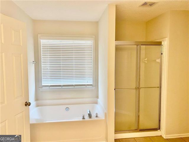 9020 Friarbridge Drive, Suwanee, GA 30024