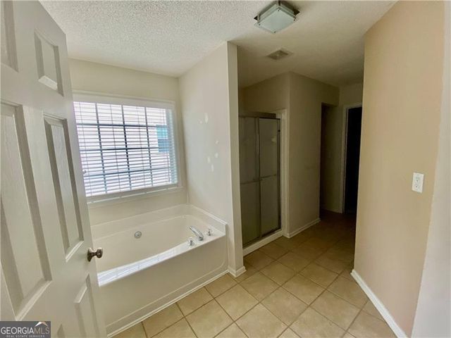 9020 Friarbridge Drive, Suwanee, GA 30024