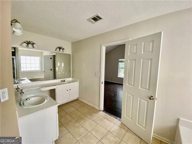 9020 Friarbridge Drive, Suwanee, GA 30024