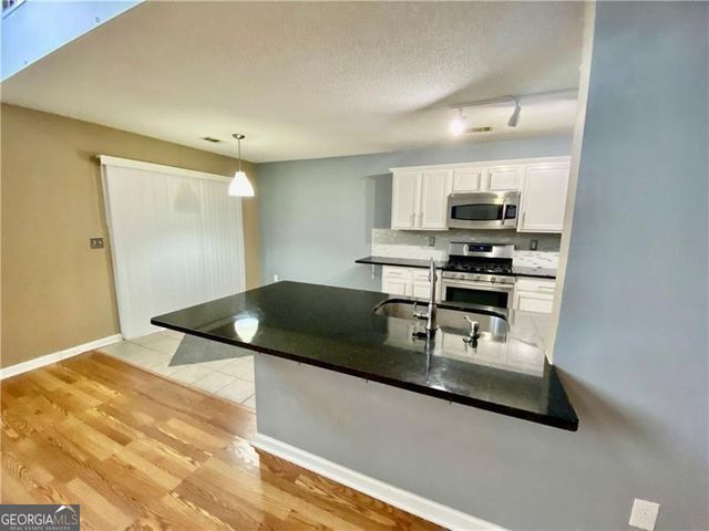 9020 Friarbridge Drive, Suwanee, GA 30024