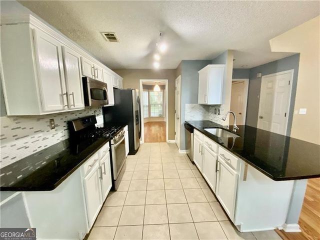 9020 Friarbridge Drive, Suwanee, GA 30024