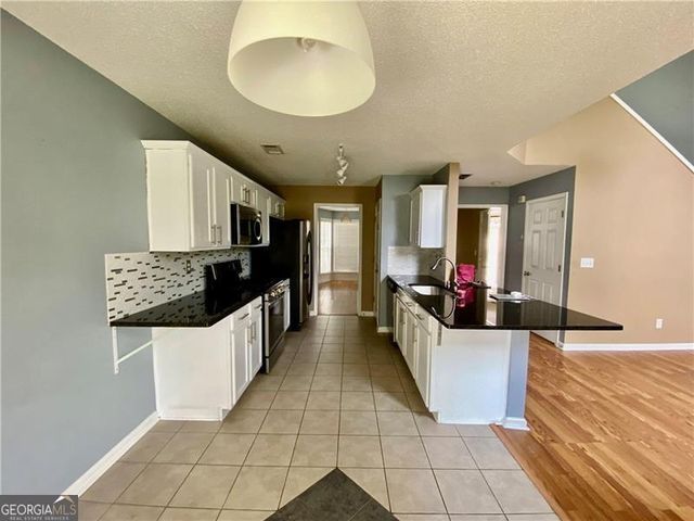 9020 Friarbridge Drive, Suwanee, GA 30024