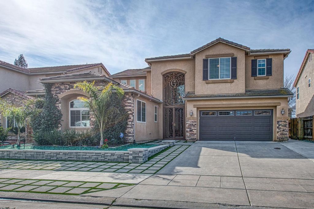 Image 1 of property listing at 1407 E Via Marbella Drive, Fresno, CA 93730