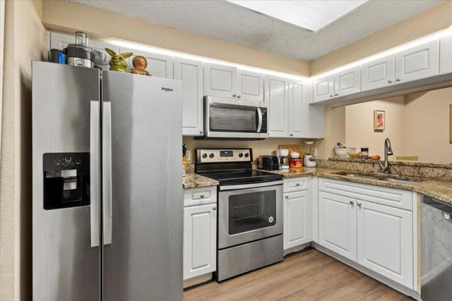 3023 Alcazar Place 201, Palm Beach Gardens, FL 33410