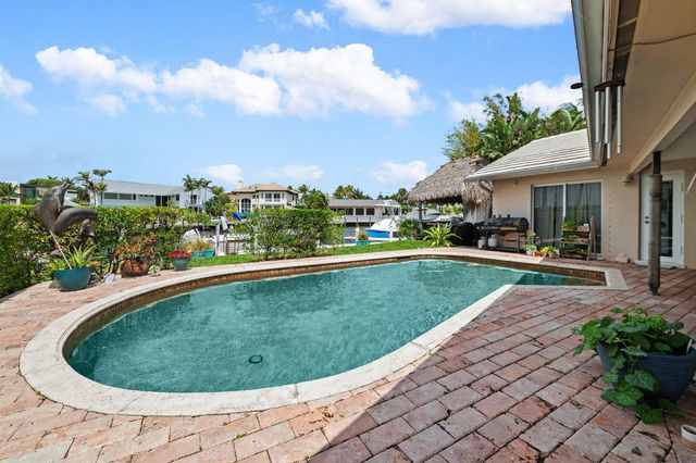3 Sabal Island Dr, Ocean Ridge, FL 33435