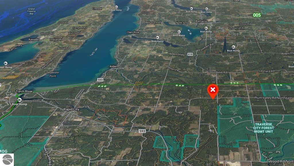 Map highlighting the location of 1091 Plum Valley Road NW in Alden, MI, showcasing surrounding geographical features, including Torch River and nearby state land access.