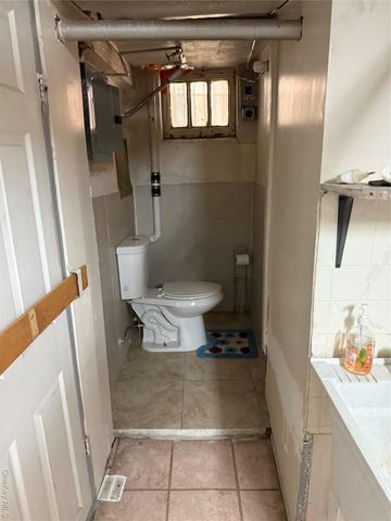 9021 189th Street, Hollis, NY 11423