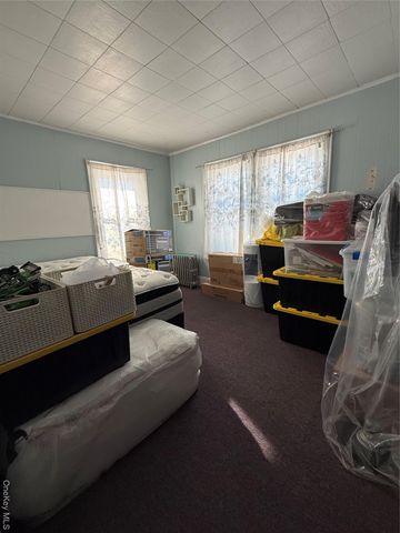 9021 189th Street, Hollis, NY 11423