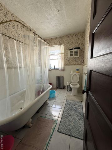 9021 189th Street, Hollis, NY 11423