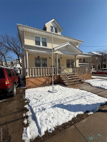 9021 189th Street, Hollis, NY 11423