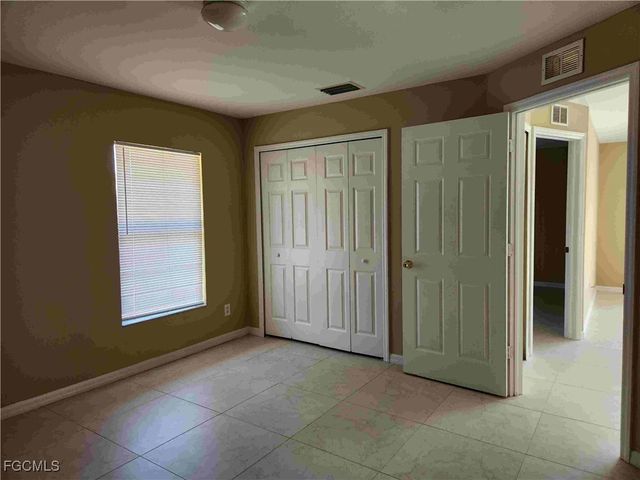 711 Jack AVE S, Lehigh Acres, FL 33973