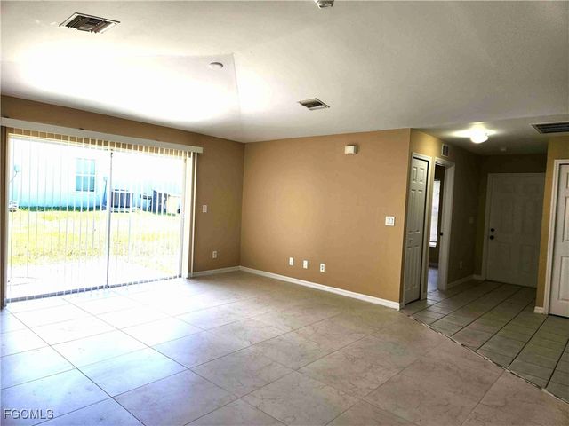 711 Jack AVE S, Lehigh Acres, FL 33973