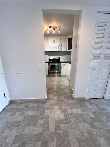 498 NW 165th St Rd D-503, Miami, FL 33169