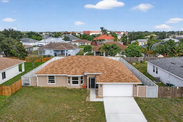 557 SW Halkell Avenue, Port St. Lucie, FL 34953