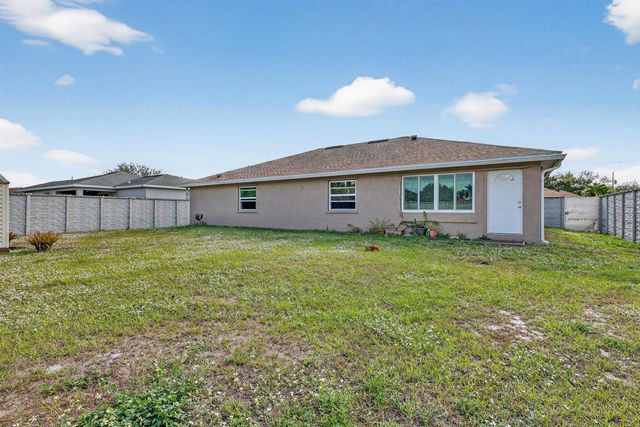 557 SW Halkell Avenue, Port St. Lucie, FL 34953