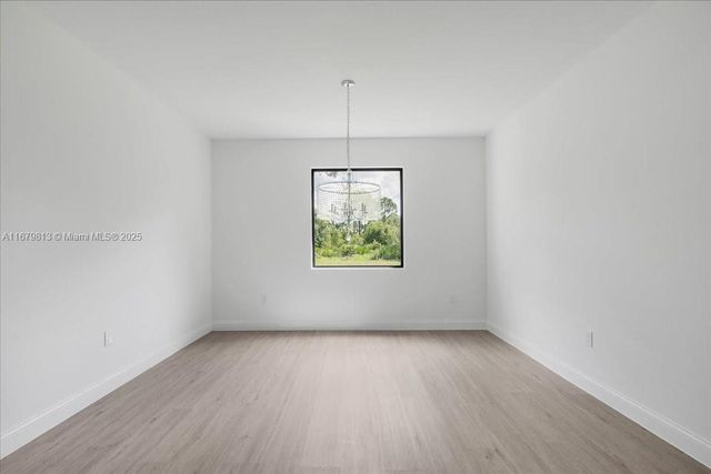 604 LAKE AVE, Lehigh Acres, FL 33972