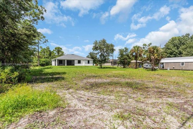 604 LAKE AVE, Lehigh Acres, FL 33972