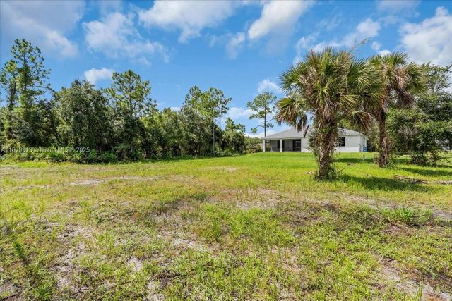 604 LAKE AVE, Lehigh Acres, FL 33972