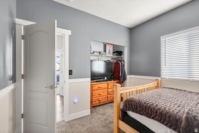 302 E INTERLOCHEN LN, Stansbury Park, UT 84074