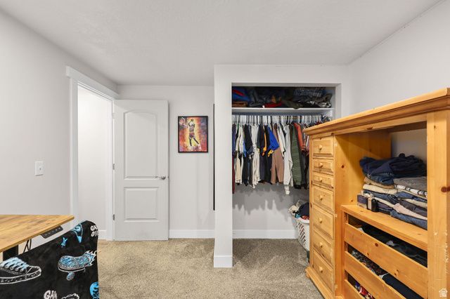 302 E INTERLOCHEN LN, Stansbury Park, UT 84074