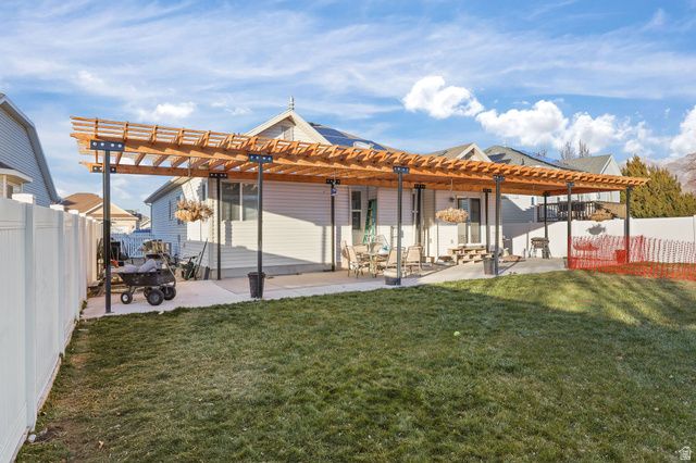 302 E INTERLOCHEN LN, Stansbury Park, UT 84074