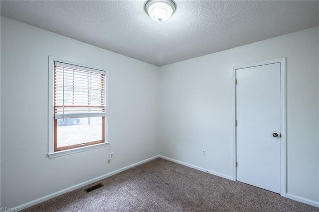 410 Riverton Court, Gibsonville, NC 27249