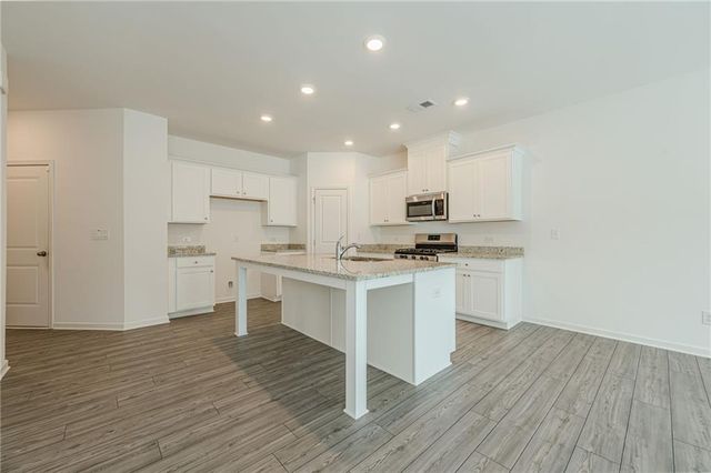 628 Isom Walk, Suwanee, GA 30024