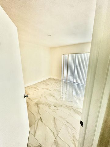 2440 Lake Osborne Drive 201, Lake Worth Beach, FL 33461