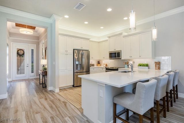 13422 Silktail DR, Naples, FL 34109