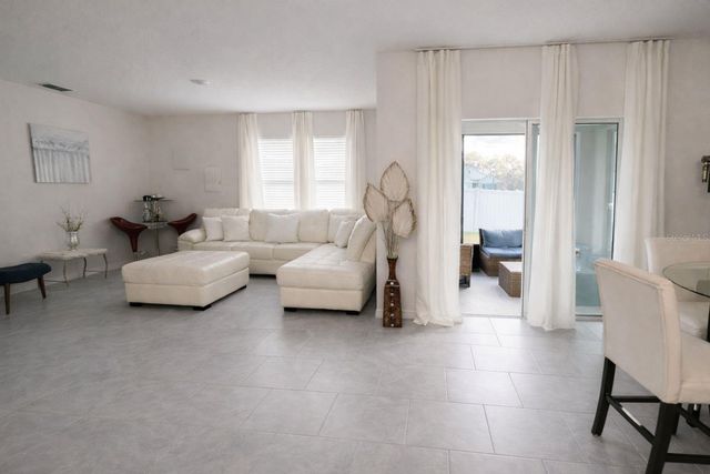 1242 IGUANA LOOP, Davenport, FL 33897