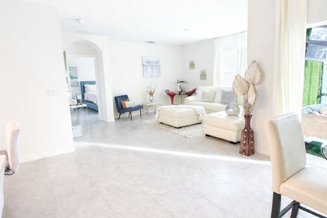 1242 IGUANA LOOP, Davenport, FL 33897