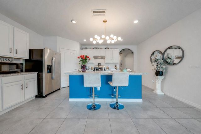 1242 IGUANA LOOP, Davenport, FL 33897