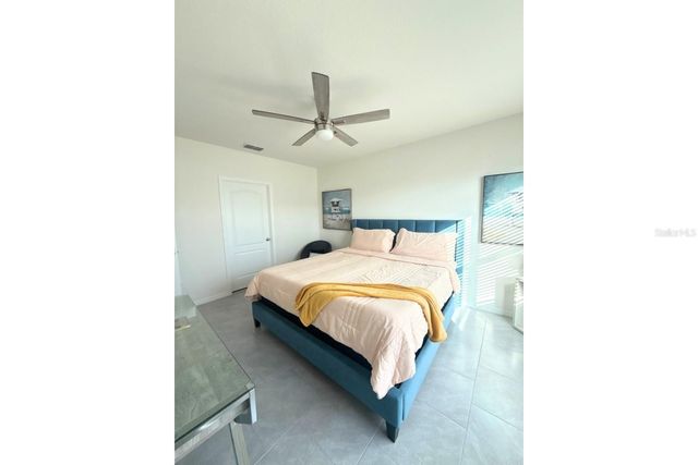 1242 IGUANA LOOP, Davenport, FL 33897