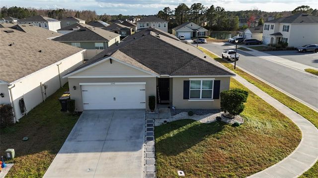 1242 IGUANA LOOP, Davenport, FL 33897