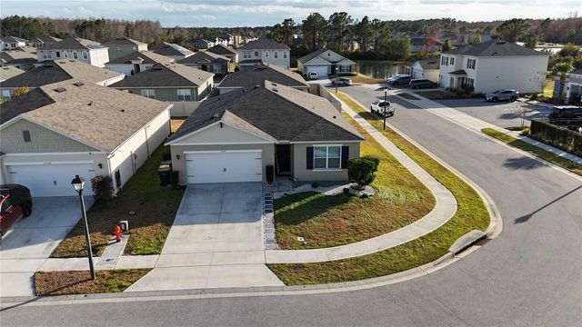 1242 IGUANA LOOP, Davenport, FL 33897