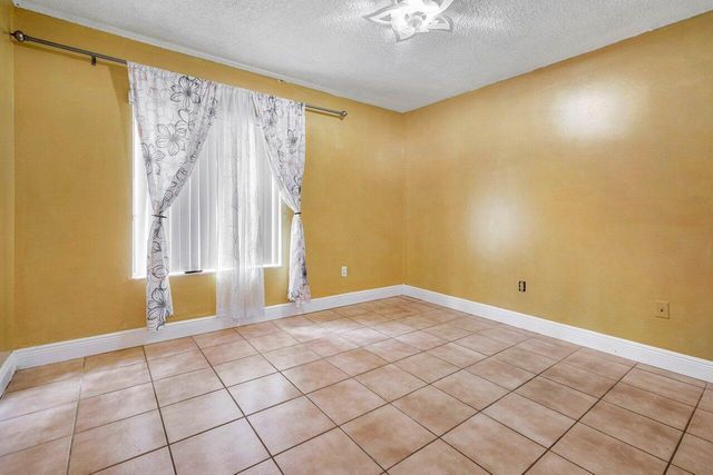 2780 Norfolk Pine Court, Lake Worth, FL 33462