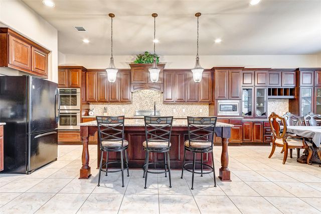 4710 Deermeadow Falls Lane, Katy, TX 77494