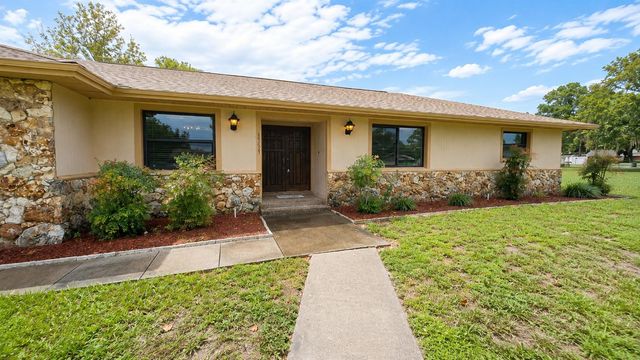 35025 RAINTREE DR, Fruitland Park, FL 34731