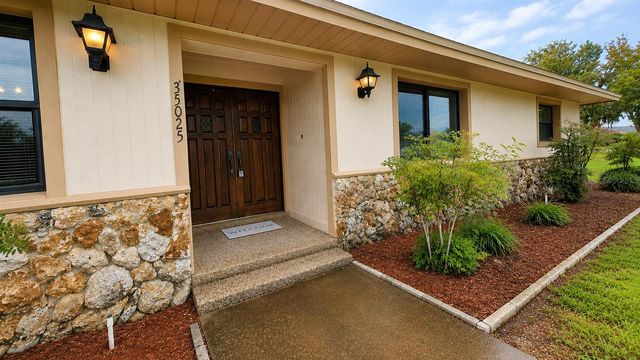 35025 RAINTREE DR, Fruitland Park, FL 34731