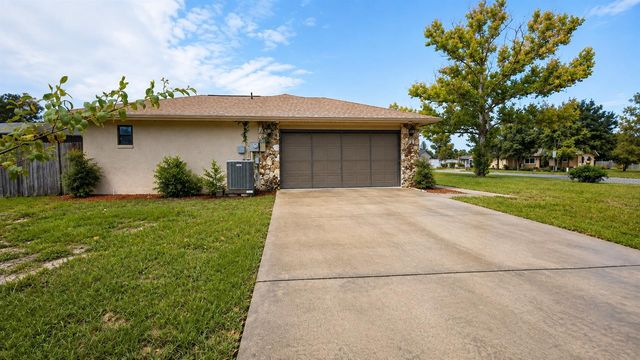 35025 RAINTREE DR, Fruitland Park, FL 34731