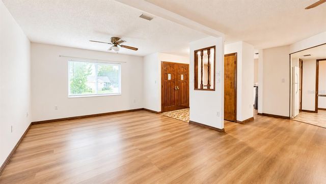 35025 RAINTREE DR, Fruitland Park, FL 34731